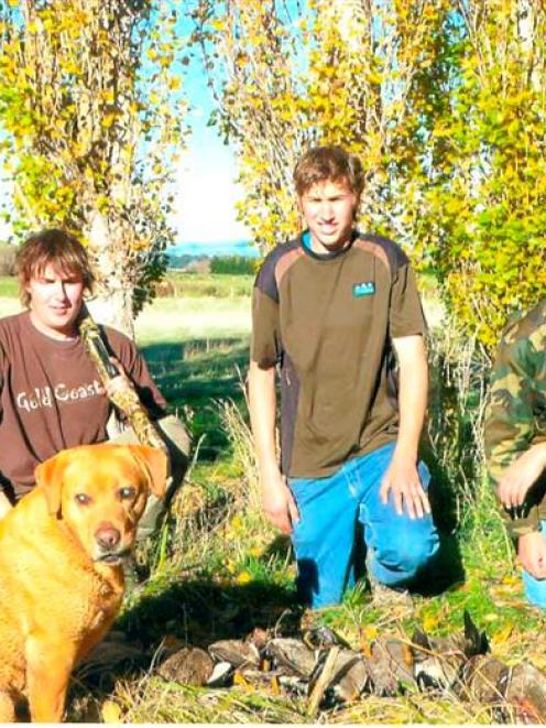 Brad (22, left), John (17) and Micheal (15) Hastie were proud of their blind gun dog Jake’s...