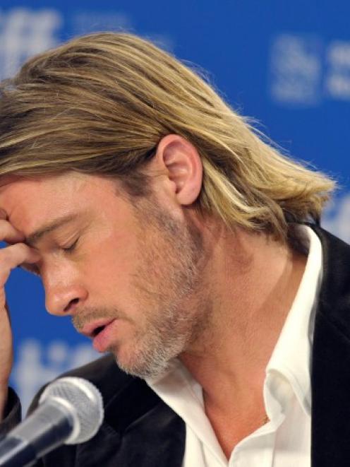 Brad Pitt attends a news conference for the film 'Moneyball' at the 36th Toronto International...