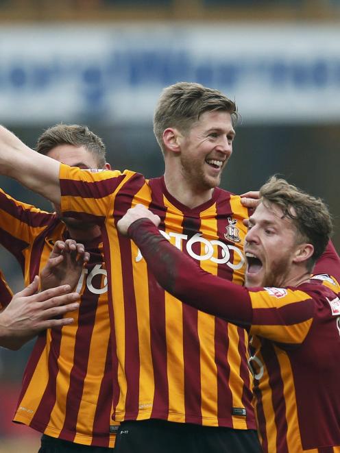 Bradford City's Jon Stead (2nd R) celebrates his goal with teammates during their FA Cup fifth...