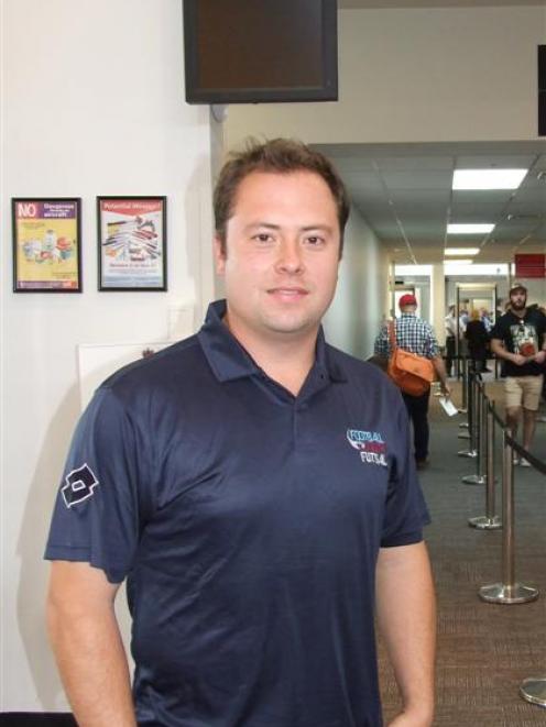 Brazilian futsal player Carlos Herrmann prepares to leave Queenstown yesterday for the national...