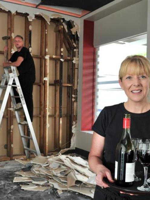 Brenda and Gary Lee begin wall demolition to create a walk-through to their neighbouring Café Rue...