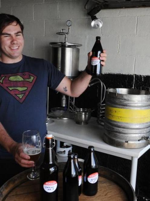 Brendan Bransgrove pictured with some of his home brew last year. Photo by Linda Robertson.