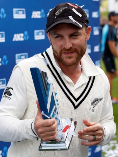 Brendon McCullum holds the trophy after winning the test series against India. REUTERS/Anthony...