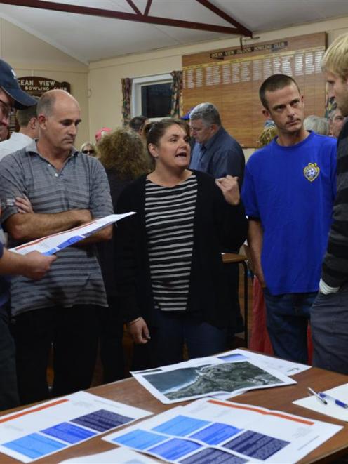 Brighton residents (from left) Adam Pauley, Melanie Kolman (obscured), Raymond Grubb, Tracy Grubb...