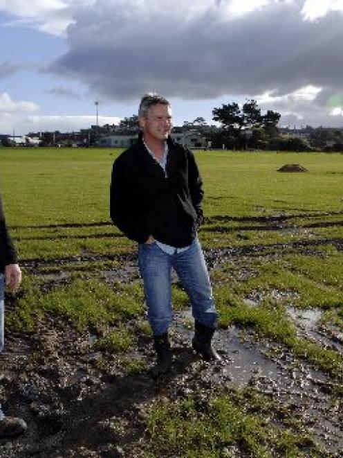 Brighton Rugby Football Club president Chris Keith (left) and Saddle Hill Community Board...