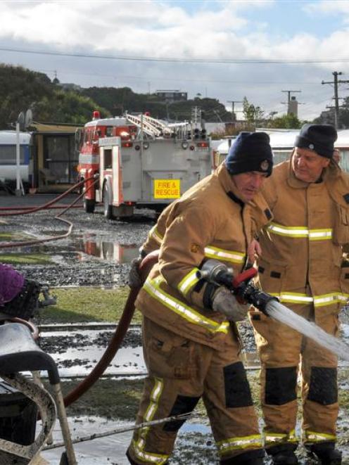 Brighton Volunteer Fire Brigade senior firefighter Barry Day (left) and Chief Fire Officer Ian...
