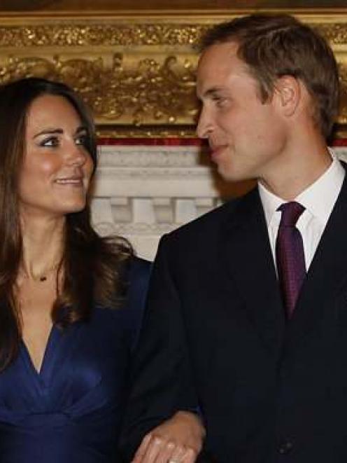 Britain's Prince William and his fiancee Kate Middleton pose for the media at St. James's Palace...
