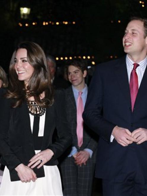 Britain's Prince William and his fiancee Kate Middleton arrive to view the Thursford Christmas...