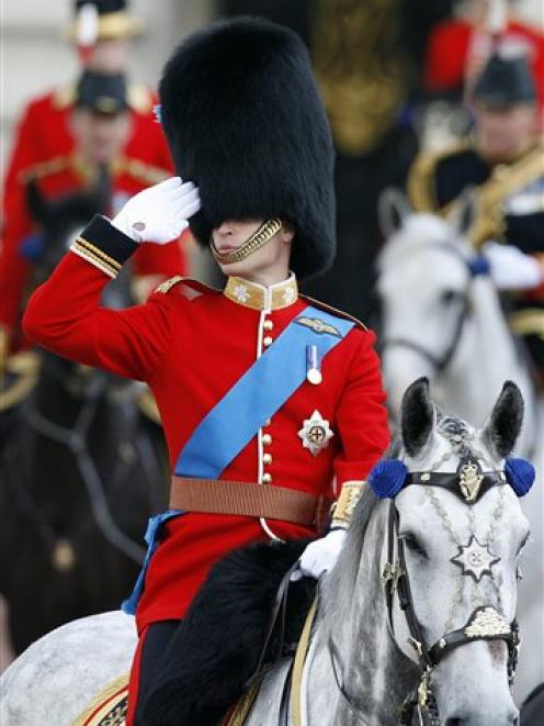 Britain's Prince William, Duke of Cambridge, rides from Buckingham Palace to the Horse Guards...