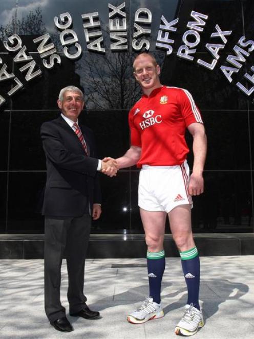 British and Irish Lions captain Paul O'Connell, right, shakes hands with head coach Ian McGeechan...