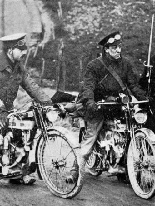 British despatch riders being directed by a French sentry in northern France.  - Otago Witness,...