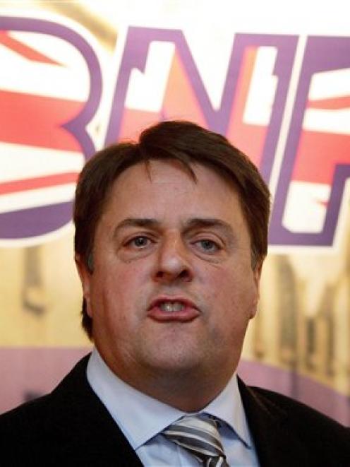 British National Party, BNP, leader Nick Griffin speaks in front of a BNP banner in Manchester,...