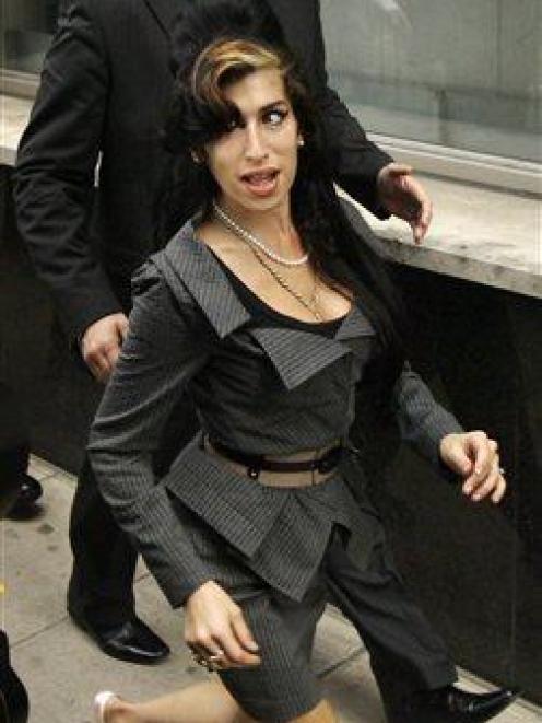 British singer Amy Winehouse arrives at the City of Westminster Magistrates Court in London...