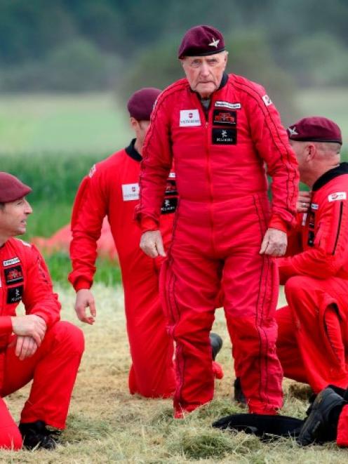 British World War 2 veteran Jock Hutton (89) stands following his landing after he and teams of...