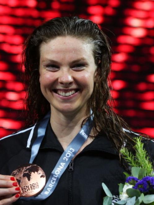 Bronze medal winner Lauren Boyle of New Zealand celebrates on the podium.  (Photo by Alexander...