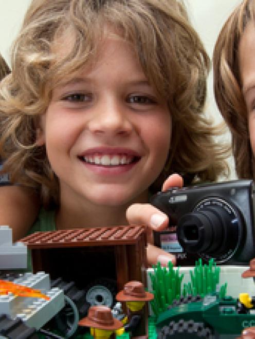 Brothers (from left) Jesse Swift, 8, Beau, 10, and Jarrah, 12, use Lego to re-enact the World War...