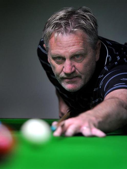 Bruce Cunningham lines up a shot during a doubles snooker game at the Mosgiel RSA yesterday....