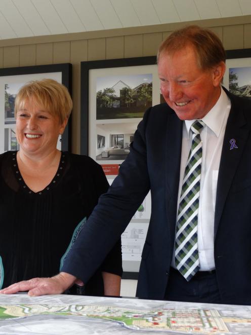 Building and Housing Minister Nick Smith and Queenstown Lakes Mayor Vanessa van Uden look at...