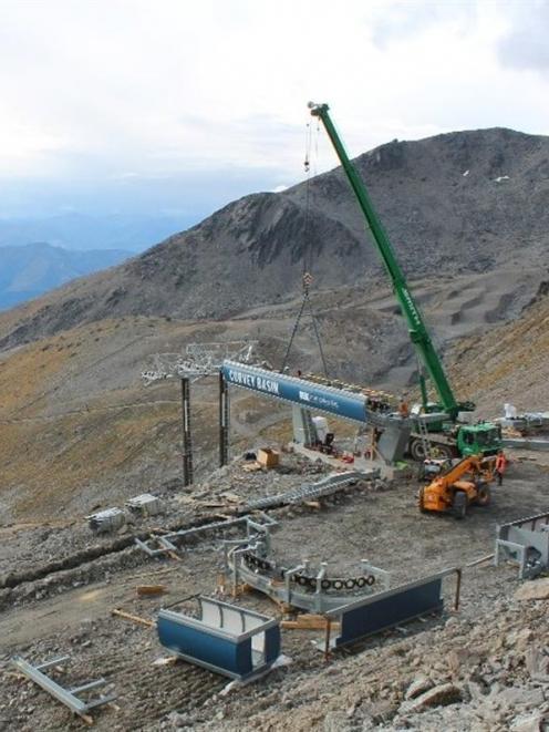 Building the Curvey Basin chairlift is  progressing at the Remarkables ski area.  The...