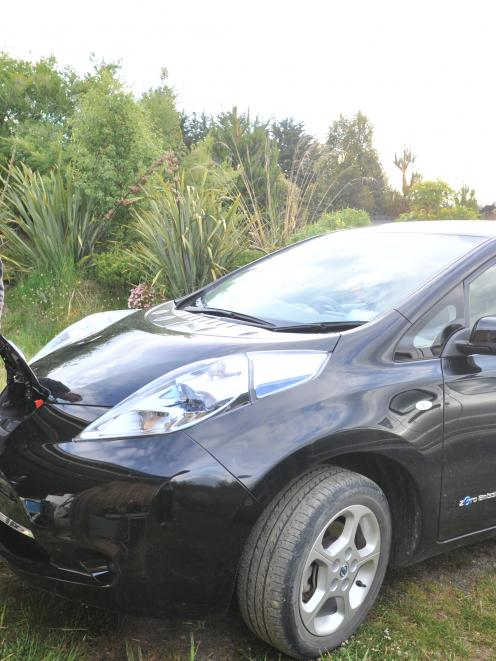 Craig Salmon, of Paihia, with his Nissan Leaf electric car in Waitati, north of Dunedin, last...