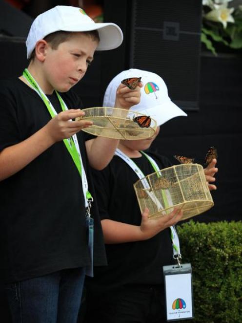 Cameron Lucas (8) and his brother Tyler (6), whose father Andrew Bishop died in the CTV building,...