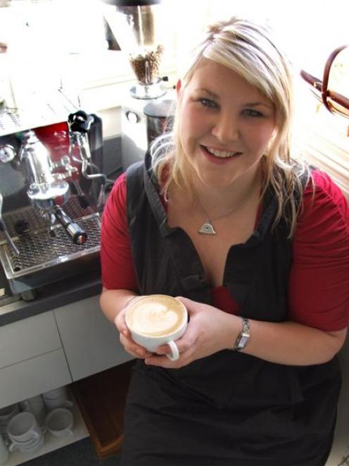 Camille Strowger hones her coffee-making skills at Pen-y-bryn Lodge in Oamaru. Photo by Sally Rae.
