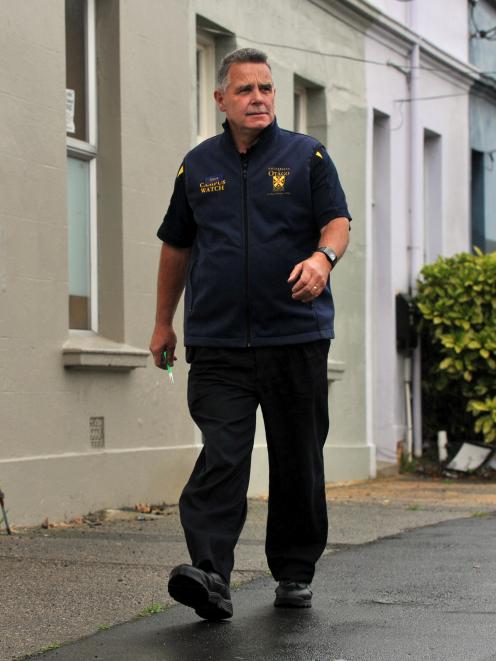 Campus Watch team leader Steve Ereckson patrols in Dundas St yesterday afternoon. Photo by Gregor...