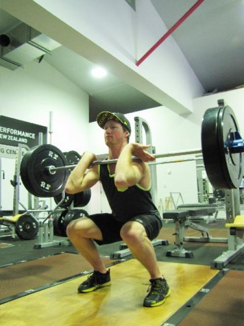 Canadian freeskier Mike Riddle lifts weights in Wanaka as part of his training build-up for the...