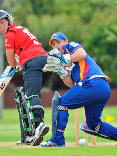 Canterbury batsman  Meg Kendal edges the ball  past Otago wicketkeeper Katey Martin during their...