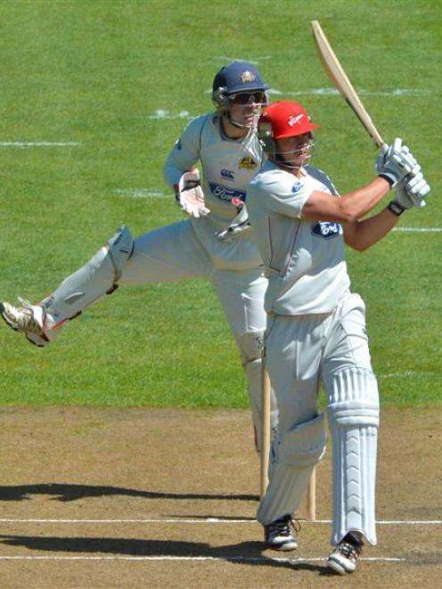 Canterbury batsman Peter Fulton plays a shot through the on side during his innings of 102 in the...