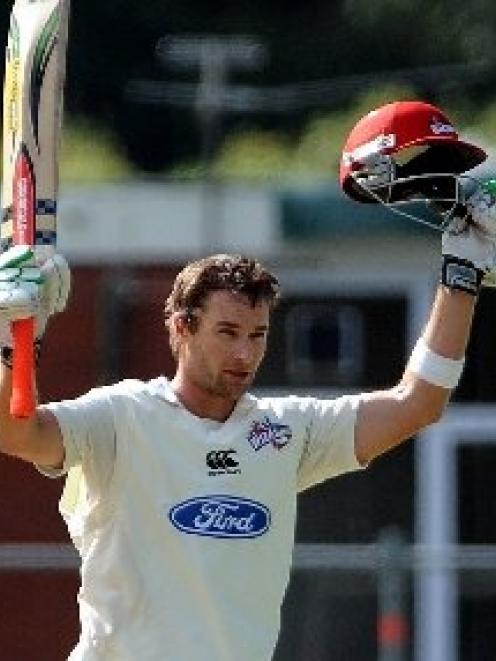 Canterbury batsman Reece Young acknowledges the crowd after scoring a century against Otago on...