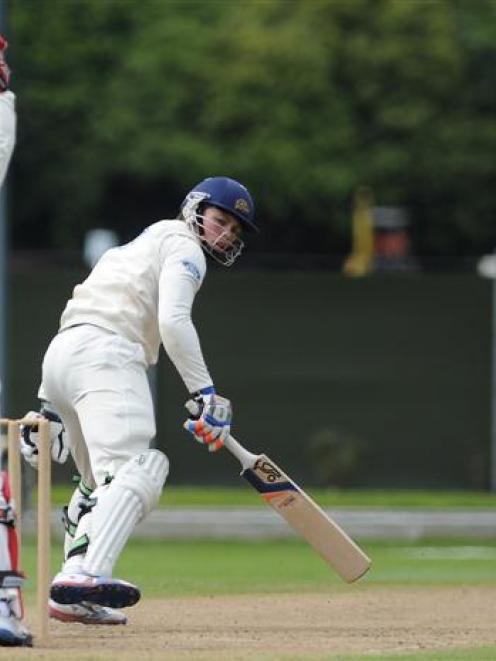 Canterbury wicket keeper Brad Cachopa (left) and bowler Cole McConchie appeal successfully to...