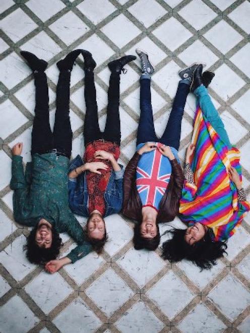 Cape-wearing Auckland psych-poppers Sherpa play in Dunedin next week. Photo supplied.