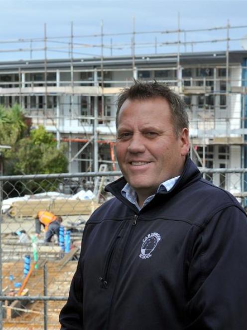 Carisbrook School principal Ben Sincock in front of the school's redevelopment work. Photo by...