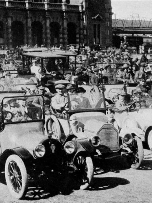 Cars drawn up at the Dunedin Railway Station, before a run to Milton for returned soldiers on...