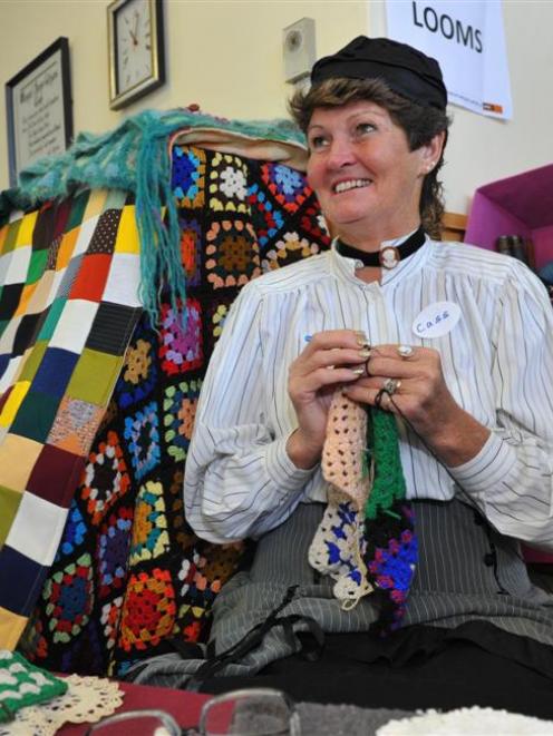 Cass Hughes, of Oamaru, crochets blanket for Nepal earthquake victims at the Altrusa Fabric Craft...