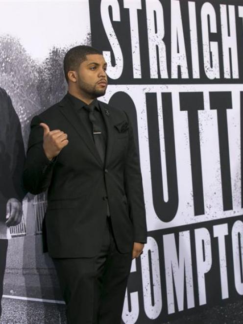 Cast member O'Shea Jackson Jr., who portrays Ice Cube, poses at the premiere of "Straight Outta...