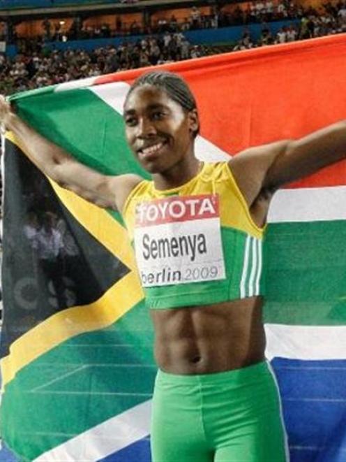 Caster Semenya, of South Africa, celebrates after wining in the women's 800m final at the world...