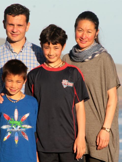 Catharine Kan, Simon Brennan and their children Tobias Brennan (12) and Joseph (8) prepare to...