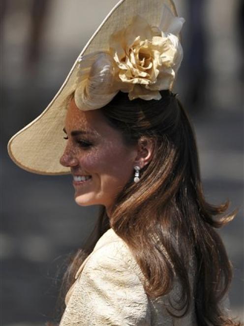 Catherine, Duchess of Cambridge, arrives for the wedding of Zara Phillips and Mike Tindall at...