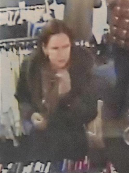 CCTV footage of the woman alleged to have stolen the coat. Photo supplied.