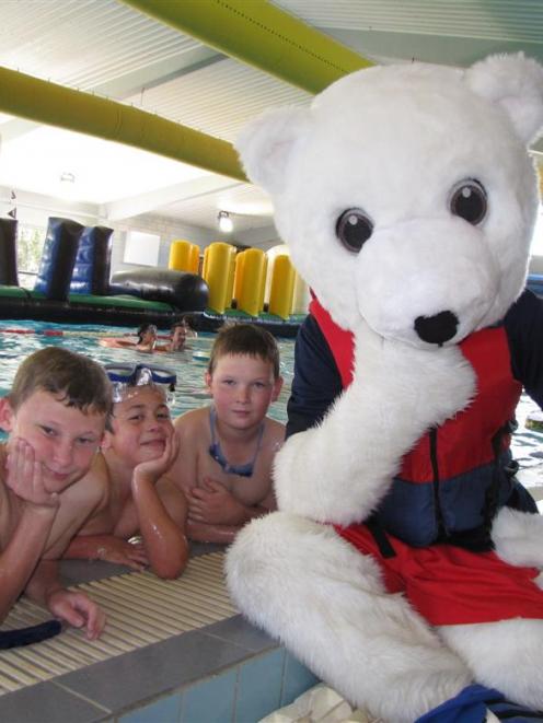 Celebrating the reopening of the Wanaka Community Pool on Saturday are (from left) Loche Cowan ...