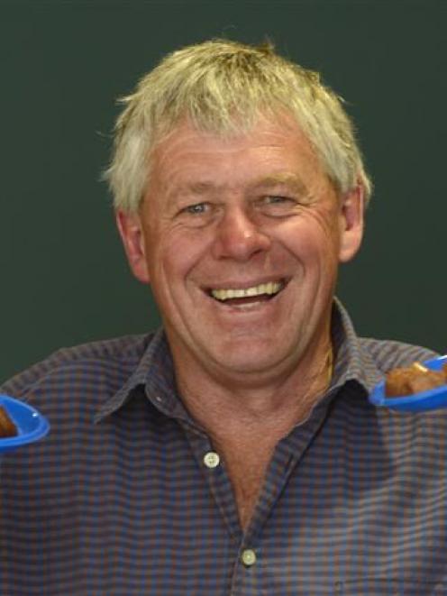Central Otago Mayor Tony Lepper displays the dishes of venison he cooked yesterday during the ...