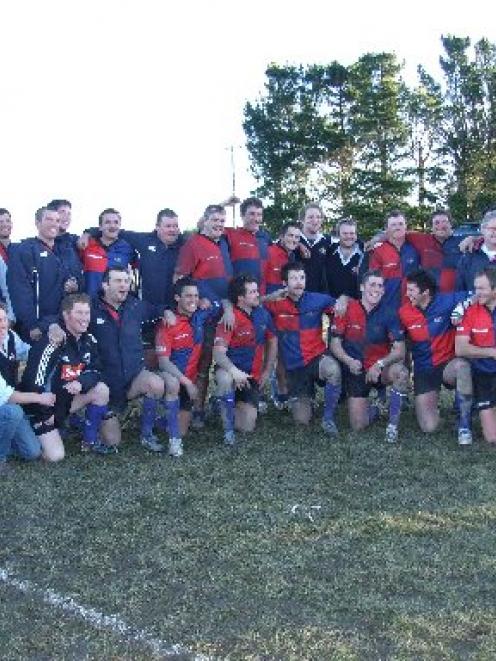 Central Otago premier grade champion Maniototo in celebration mode after beating Arrowtown 19-16...