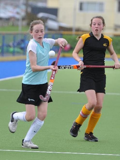 Central Otago's Ruby Gibson demonstrates her skills at the under-15 hockey tournament at the...
