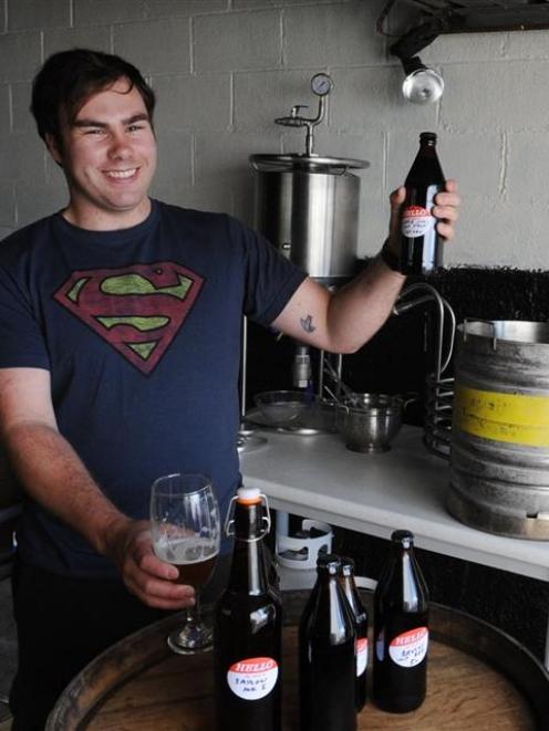 Champion home-brewer Brendan Bransgrove checks the quality of his award-winning Little Jimi...