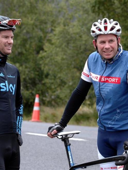 Champion international cyclist Greg Henderson (left) talks with the president of Cycling Otago,...