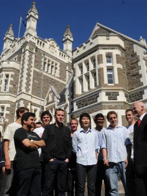 Chatting to Otago Boys' High School rector Clive Rennie (second from right) are former pupils ...