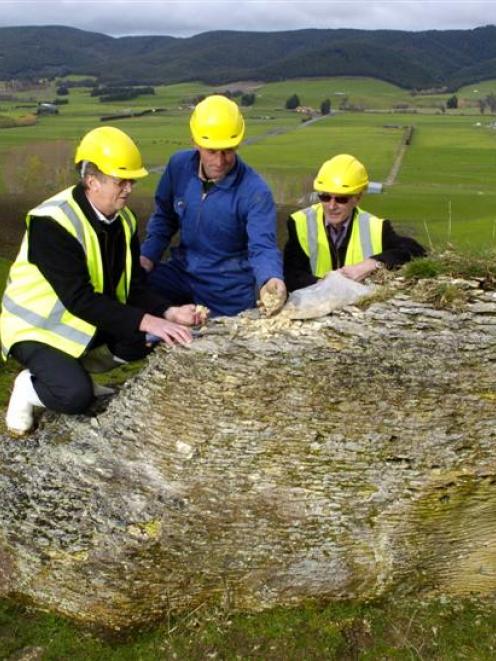 Checking phosphate samples at Clarendon, in South Otago, are (from left), Ravensdown chief...
