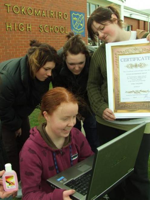Checking their new website are the Tokomairiro High School Young Enterprise scheme members, from...
